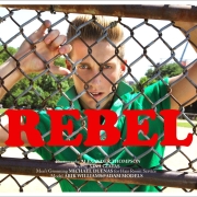 Arik Williams wears vintage knit from 10 Ft. Single NYC for the editorial "Rebel" for Ponyboy magazine, featuring men's vintage style, Rockabilly, 50's, men's fashion. Photography by Alexander Thompson.