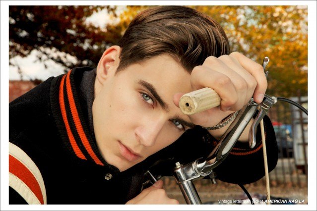 Fusion model Samuel Roberts wearing a vintage letterman's jacket for the Ponyboy Magazine men's editorial "The Ivy League", photographed by Alexander Thompson in New York City.