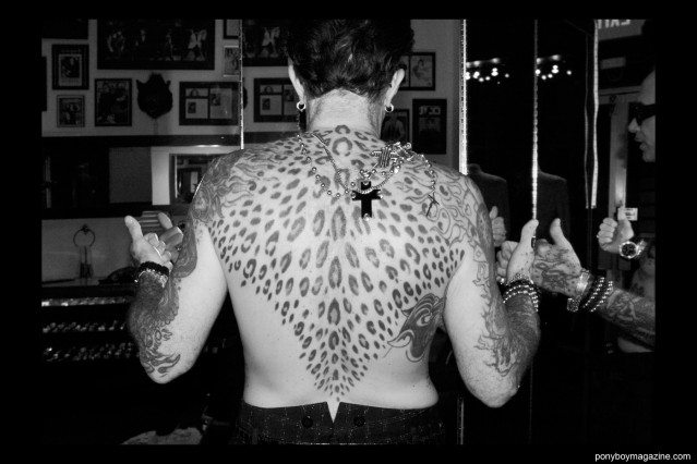 Leopard print back tattoo on Michele Savoia. Photographed on the Lower East Side in New York City by Alexander Thompson for Ponyboy Magazine.