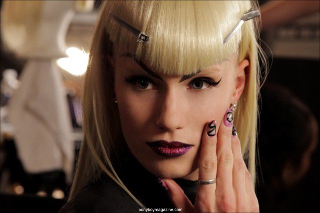 A model shows off her elaborate nails backstage at The Blonds A/W 2014 collection. Photographed by Alexander Thompson for Ponyboy Magazine.