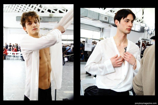 Models Paul-Alexandre Haubtmann and Artur C. photographed getting dressed, backstage at Duckie Brown F/W15 collection. Photo for Ponyboy magazine by Alexander Thompson.