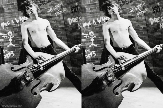 A shirtless Lee Rocker, upright bassist for 80's neo-rockabilly band Stray Cats, photographed by Manfred Becker. Ponyboy magazine.
