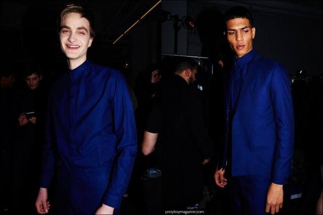 Male models Robert Laby and Geron McKinley photographed backstage in Carlos Campos F/W16 menswear. Photography by Alexander Thompson for Ponyboy magazine.