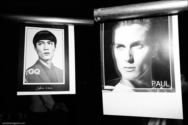 Model comp cards hang backstage at the Duckie Brown F/W16 menswear show. Photography by Alexander Thompson for Ponyboy magazine.
