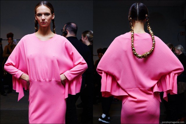 A model photographed in pink ruffle sleeve dress, backstage at A Détacher Fall 2016 show. Photography by Alexander Thompson for Ponyboy magazine.