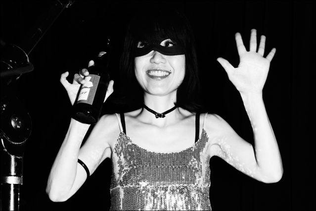 Bassplayer Rie, from The Stompin Riffraffs. Photographed in New York City at Berlin, for Ponyboy magazine by Alexander Thompson.