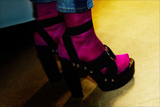 Studded platform shoes with vibrant fuchsia socks backstage at the Adam Selman Fall 2017 show. Photography by Alexander Thompson for Ponyboy magazine.
