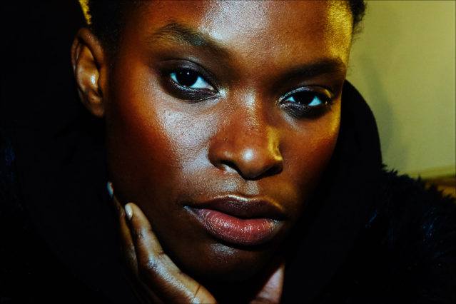 Model Barbra-Lee Grant photographed backstage in hair/makeup at the Adam Selman Fall 2017 womenswear show. Photography by Alexander Thompson for Ponyboy magazine.