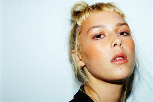 Beauty shot of a model backstage after hair/makeup at Adam Selman Fall 2017. Photographed by Alexander Thompson for Ponyboy magazine.