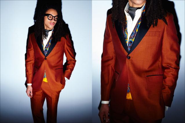 A male model wears an orange tuxedo by designer David Hart, for Fall/Winter 2017. Photography by Alexander Thompson for Ponyboy magazine.