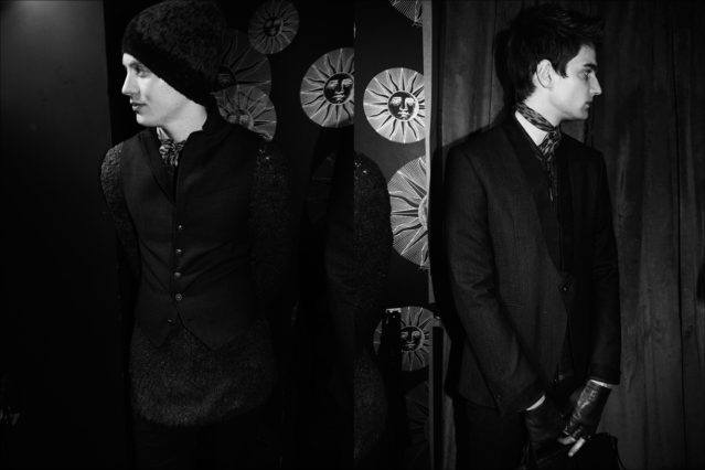 Male model Sid Ellisdon photographed backstage in John Varvatos F/W17 menswear. Photography by Alexander Thompson for Ponyboy magazine.