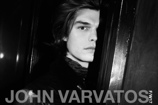 Model Jesse Gwin photographed backstage in hair and makeup at the John Varvatos Fall/Winter 2017 menswear show. Photography by Alexander Thompson for Ponyboy magazine.
