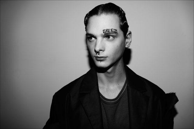Portrait of a male model photographed backstage at the Private Policy F/W17 menswear presentation. Photography by Alexander Thompson for Ponyboy magazine.