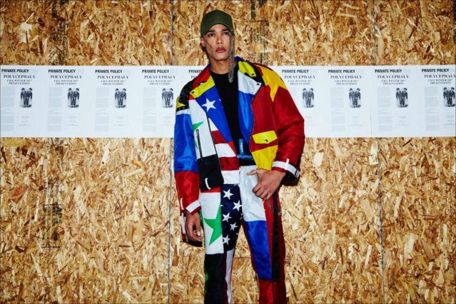 A jacket and trouser set constructed from flags on model Josh Bartley, photographed at the Private Policy F/W17 menswear presentation. Photography by Alexander Thompson for Ponyboy magazine.