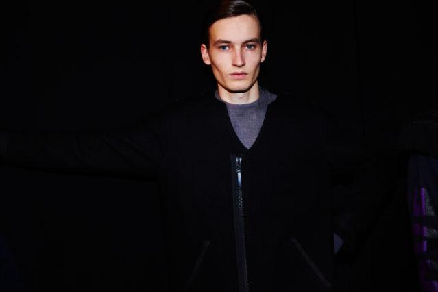 A male model photographed backstage at the Robert Geller Autumn/Winter 2017 menswear show in New York City. Photography by Alexander Thompson for Ponyboy magazine.