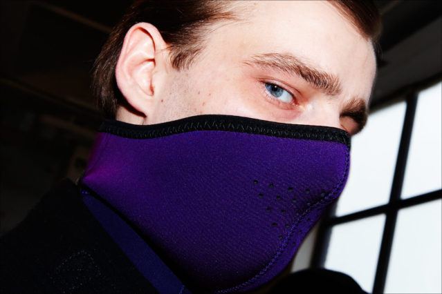Model Laurie Harding snapped backstage in a face mask at Robert Geller Autumn/Winter 2017 menswear show. Photographed by Alexander Thompson for Ponyboy magazine New York.