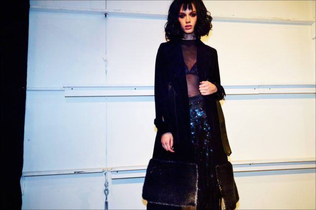 Model Jenia Ierokhina poses before walking, backstage at Georgine F/W17 womenswear show. Photography by Alexander Thompson for Ponyboy magazine.