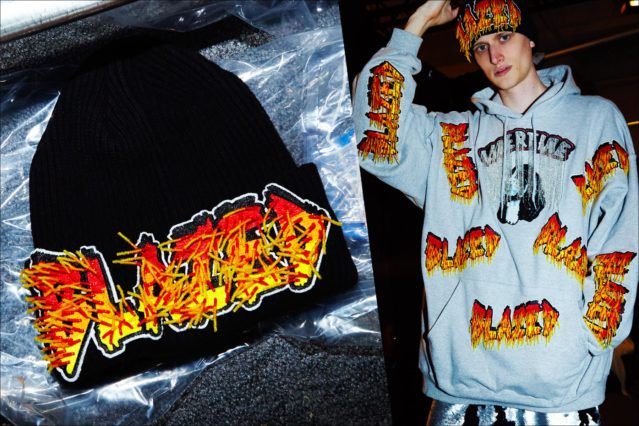 Model Alexander Newman wears a "blazed" Libertine sweatshirt and hat, backstage at Libertine F/W17 collection. Photography by Alexander Thompson for Ponyboy magazine.
