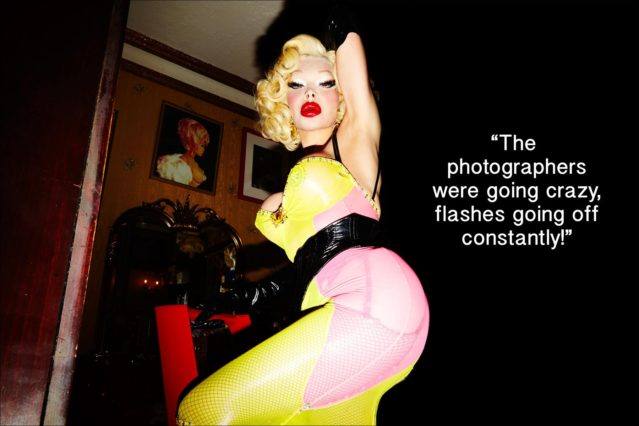 Model Amanda Lepore poses on a lader in her home in New York City. Photographed by Alexander Thompson for Ponyboy magazine.