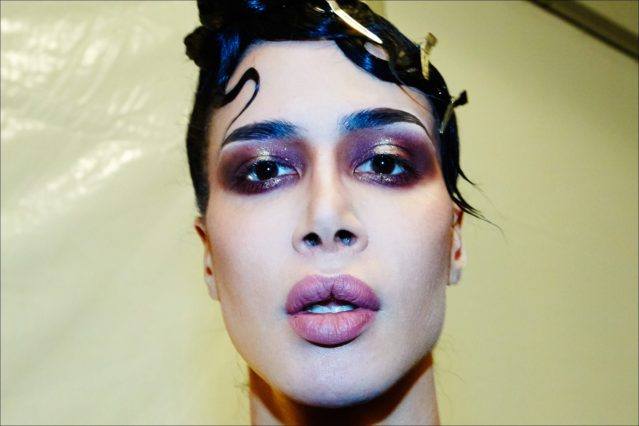 Model Gisele Alicea photographed backstage in hair & makeup at The Blonds Fall 2017 collection. Photography by Alexander Thompson for Ponyboy magazine.