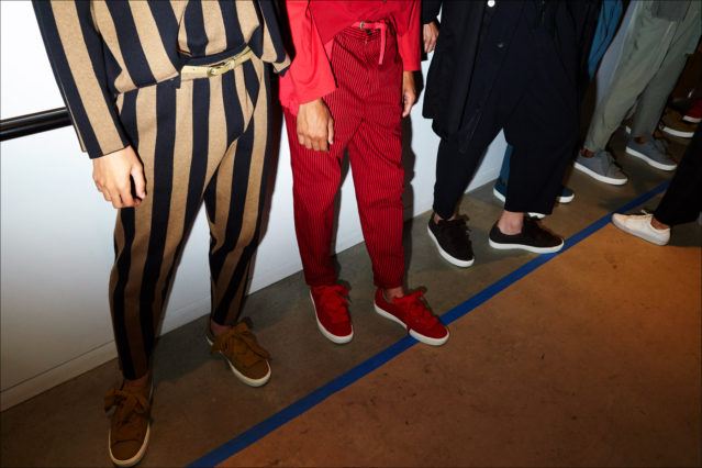 Trousers and sneakers snapped backstage at Gustav Von Ashcenbach Spring 2018 menswear show by designer Robert Geller. Photographed by Alexander Thompson for Ponyboy magazine.