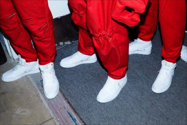 Detail shot of trousers and sneakers, backstage at Feng Chen Wang menswear. S/S18. Photography by Alexander Thompson for Ponyboy magazine.