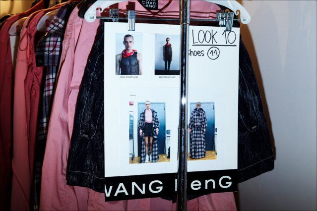 A model's look board snapped backstage at the Feng Chen Wang menswear show. Photographed by Alexander Thompson for Ponyboy magazine.