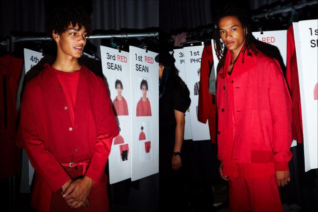 Models dressed in red, backstage at Gustav Von Ashcenbach Spring 2018 menswear show by designer Robert Geller. Photographed by Alexander Thompson for Ponyboy magazine.
