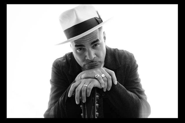 B&W portrait of The Original Harlem Slim, musician Tito Deler. Photographed in New York City for Ponyboy magazine by Alexander Thompson.