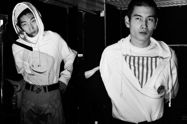 B&W images of models dressing backstage at Feng Chen Wang for Fall 2018. Photography by Alexander Thompson for Ponyboy magazine.