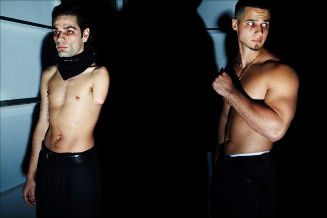 Shirtless models photographed before walking backstage for menswear designer Willy Chavarria for Fall 2018. Photography by Alexander Thompson for Ponyboy magazine.
