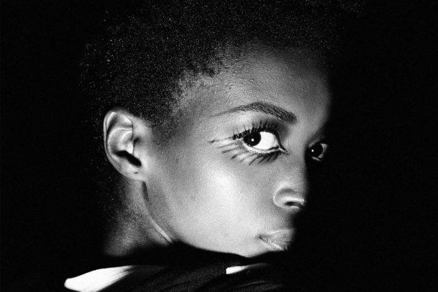 Heavy spiky bottom lashes on model Amira, backstage at the Christian Cowan womenswear show for Fall 2018. Photography by Alexander Thompson for Ponyboy magazine.