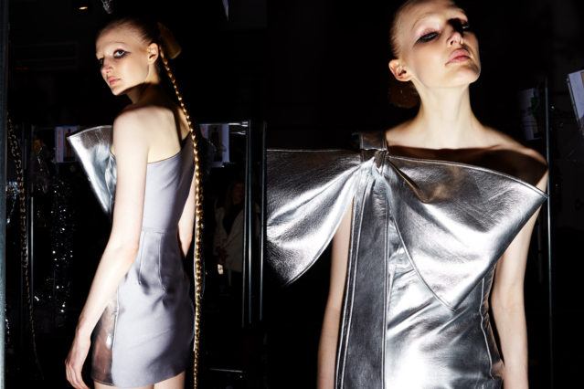 An exaggerated bow dress backstage at Christian Cowan for Fall 2018. Photography by Alexander Thompson for Ponyboy magazine.