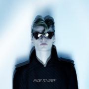 Model Miles Montierth wears a Saint Laurent sunglasses and a vintage Thierry Mugler Couture trenchcoat for Ponyboy menswear editorial, photographed by Alexander Thompson.