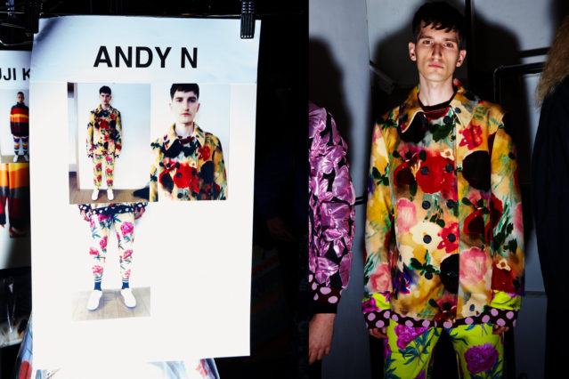 Male model Andy N. photographed backstage at Libertine Fall 2018 by Alexander Thompson for Ponyboy magazine.