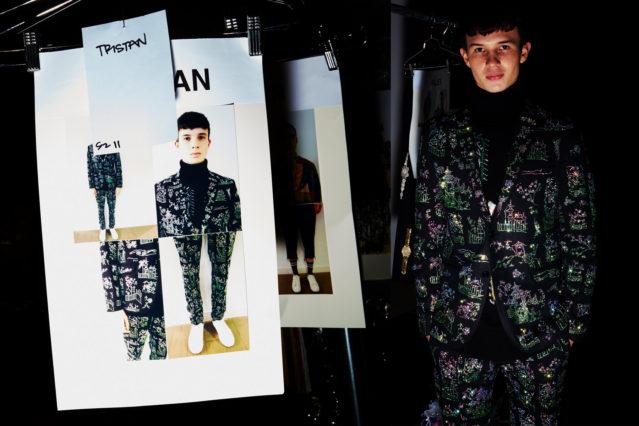 Male model Tristan photographed backstage at Libertine Fall 2018 by Alexander Thompson for Ponyboy magazine.