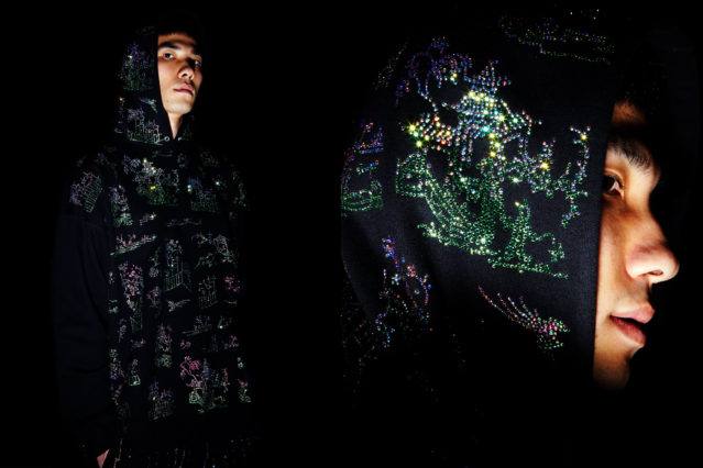 A rhinestoned pagoda print on a hoodie backstage at Libertine Fall 2018. Photography by Alexander Thompson for Ponyboy magazine.