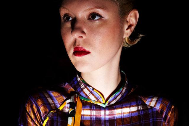 Beauty shot of a model backstage at Snow Xue Gao Fall/Winter 2018. Photographed by Alexander Thompson for Ponyboy magazine.