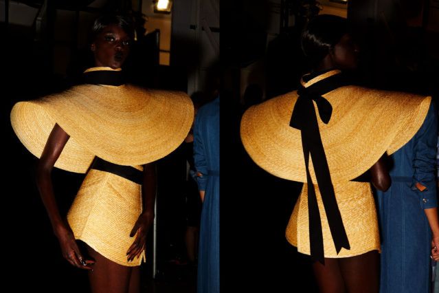 Model Duckie Thot photographed backstage in a Christian Cowan straw hat ensemble for Spring/Summer 2019. Photography by Alexander Thompson for Ponyboy magazine.