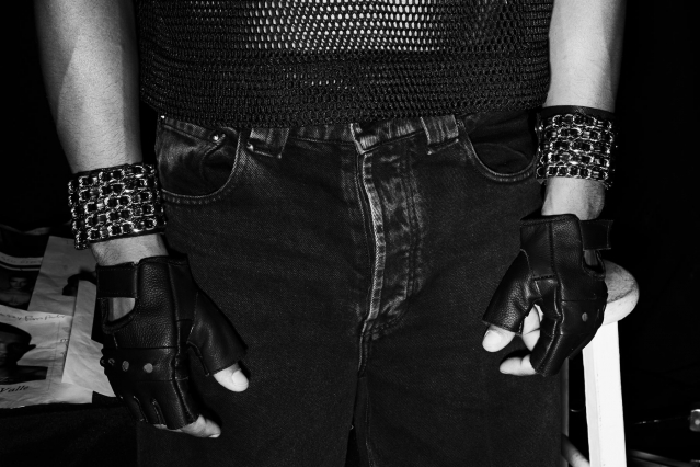 "Chanel" style leather cuffs and gloves snapped backstage at the Willy Chavarria S/S 2020 show. Photography by Alexander Thompson for Ponyboy magazine.